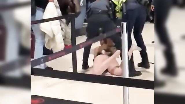 Pussy And Boobs Exposed In Public As White American Girl On Drugs Strips Naked And Runs Mad In A Jamaican Airport - 4 image