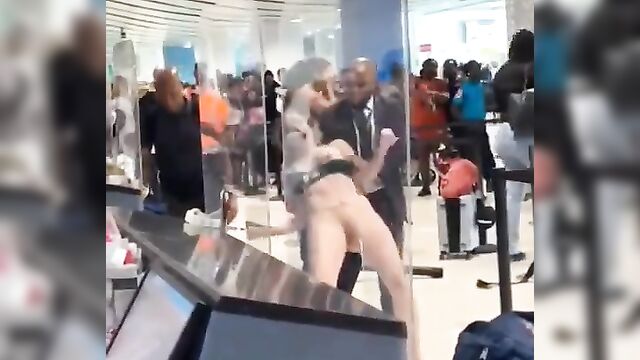 Pussy And Boobs Exposed In Public As White American Girl On Drugs Strips Naked And Runs Mad In A Jamaican Airport - 5 image