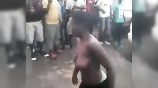 Busty African Woman Caught Fighting Her Boyfriend In Public - 3 image