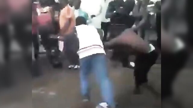 Busty African Woman Caught Fighting Her Boyfriend In Public - 4 image