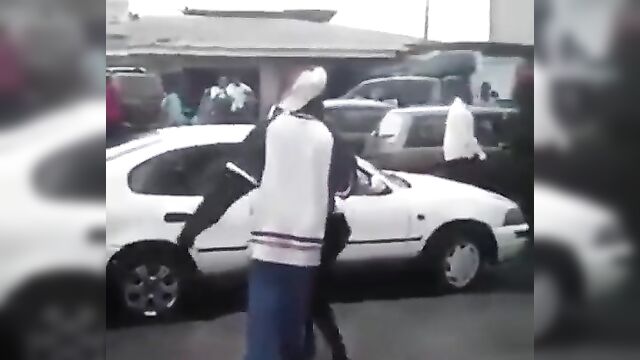 Busty African Woman Caught Fighting Her Boyfriend In Public - 5 image