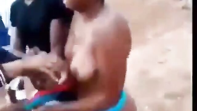 Side Chick With Sweet Boobs And Ass Stripped Naked And Beaten In Public For Allegedly Cheating With A Married Man - 1 image