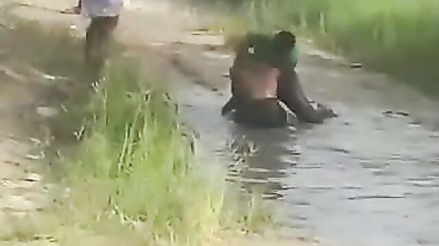 2 Nigerian Girls Caught Fighting Over A Man In Muddy Water In Public - 1 image