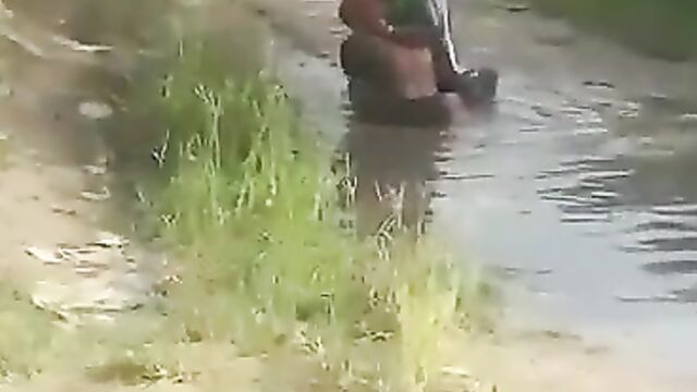 2 Nigerian Girls Caught Fighting Over A Man In Muddy Water In Public - 5 image