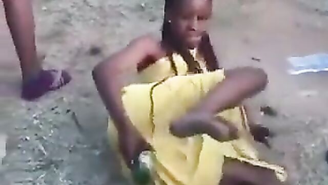 Girl Goes Wild With A Bottle In Her Pussy In Public At An African Party - 4 image