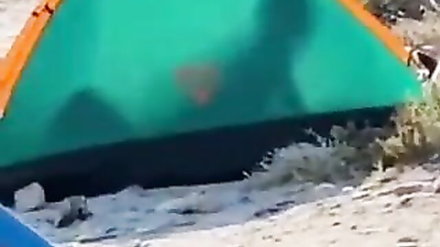 Couple Caught Having Hot Doggy Style Sex In Public In Tent On The Beach - 1 image
