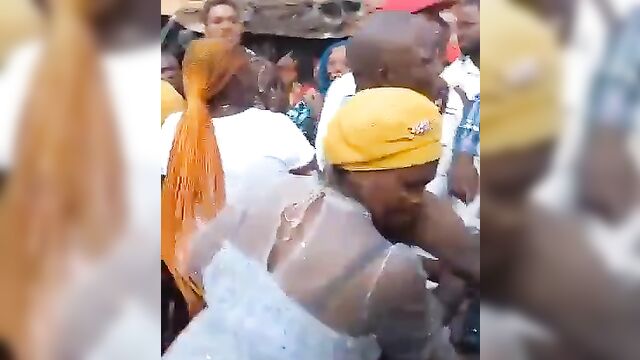 African Dude And His GF With Big Breasts Stripped Naked And Beaten In Public For Allegedly Stealing - Part 1 - 2 image