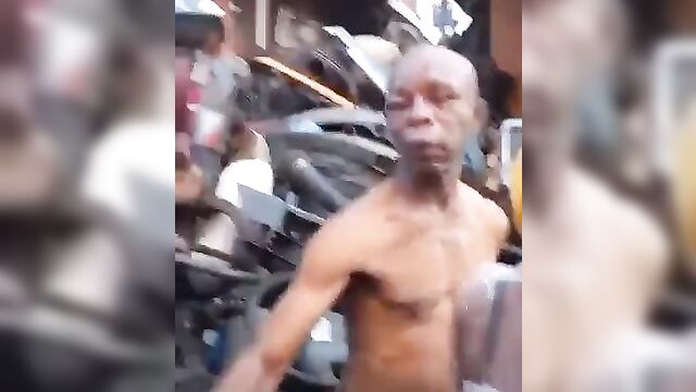 African Dude And His GF With Big Breasts Stripped Naked And Beaten In Public For Allegedly Stealing - Part 1 - 4 image