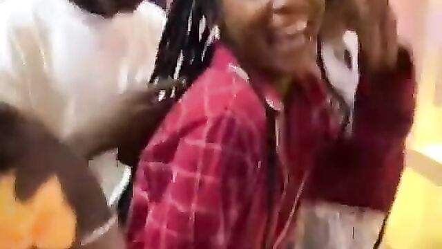 Guy Squeezing Breasts In Public In Crazy Nigerian Game Party - 3 image