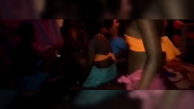 Ebony whore fingering herself and playing with bottle in her pussy in public at a club party - 1 image