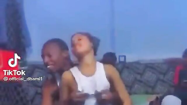 Lagos Boy Squeezing Girlfriend’s Breasts In Public - 1 image
