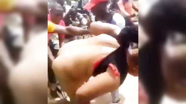 Pussy And Ass Exposed As Nigerian Whore Is Stripped Naked And Beaten In Public Allegedly For Stealing - 2 image