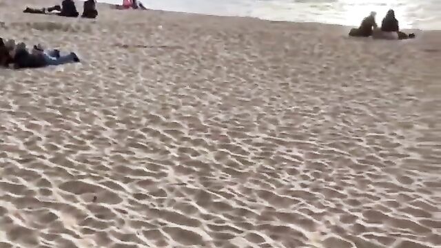 Randy Couple Caught Having Sex In A Tent On The Beach In Public - 1 image