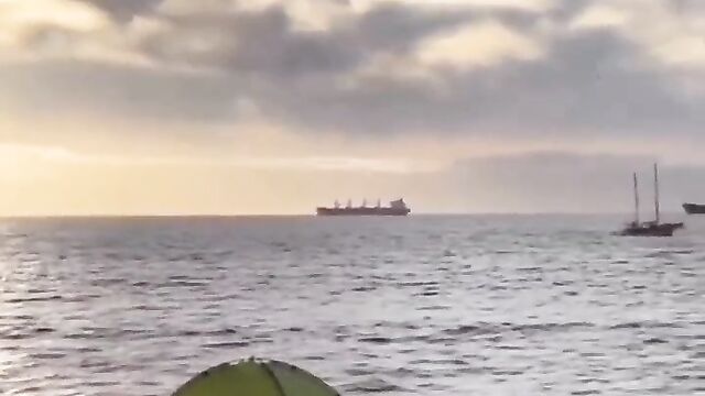 Randy Couple Caught Having Sex In A Tent On The Beach In Public - 5 image