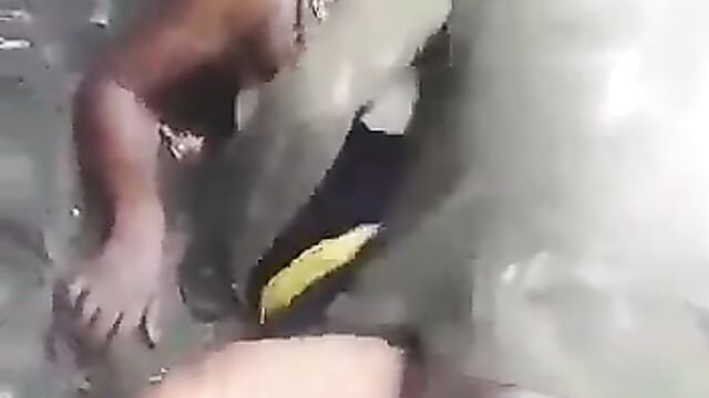 African Woman Caught Having Sex With A Mad Man In Public Allegedly For Money Rituals