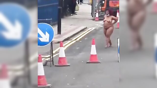 Naked Crazy Whore With Big Ass Caught In Public In UK, Obstructing Traffic