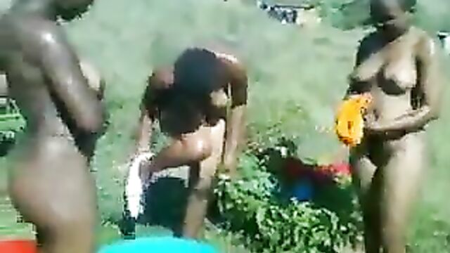 3 Naked African School Girls Showing Their Breasts To Their Sugar Daddy In Public - 1 image