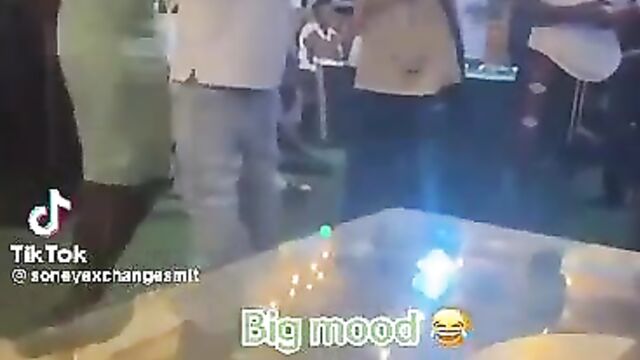 Nigerian Guy Pressing And Squeezing His Girlfriend’s Breasts In Public At A Party - 1 image