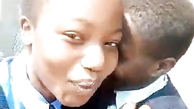 2 Naughty School Girls Caught Smoking In Public For Their Boyfriends After School In Zimbabwe - 3 image