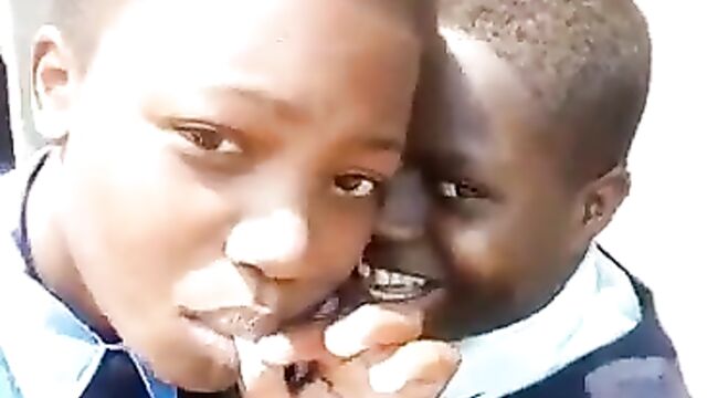 2 Naughty School Girls Caught Smoking In Public For Their Boyfriends After School In Zimbabwe - 4 image