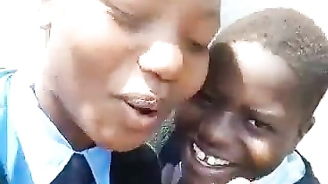 2 Naughty School Girls Caught Smoking In Public For Their Boyfriends After School In Zimbabwe - 5 image