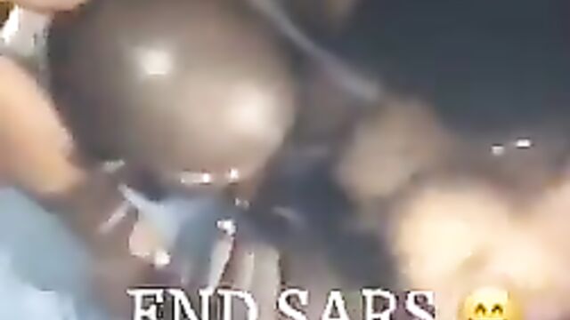 Nude video of Yahoo boy sucking breasts of naked slay queens at a club during #EndSars protests - 3 image