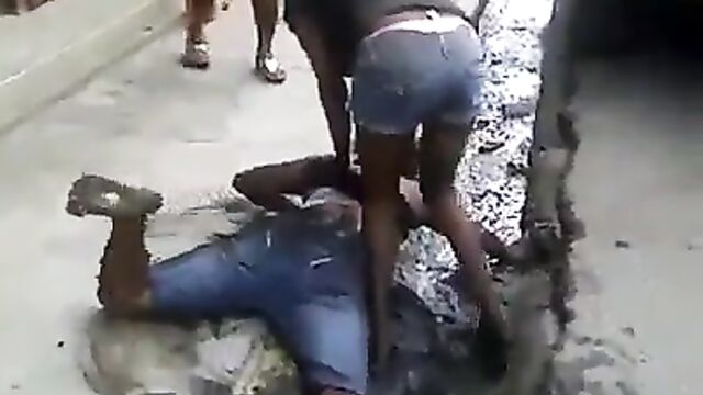 Breasts and nipples on display in public in brutal girl street fight, as girl beats up and drags her boyfriend’s side chick into a gutter! - 5 image