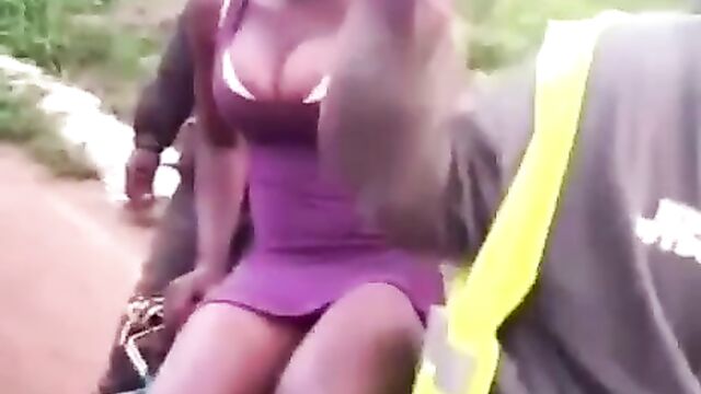 Ashawo Exposing Her Toto On A Bike In Public - 3 image