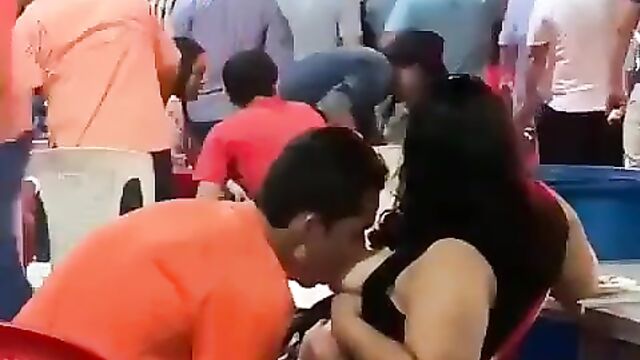 Guy Sucking Girlfriend’s Breasts In Public - 5 image