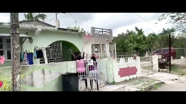 Breasts pop out as Jamaican girls fight in public - 1 image