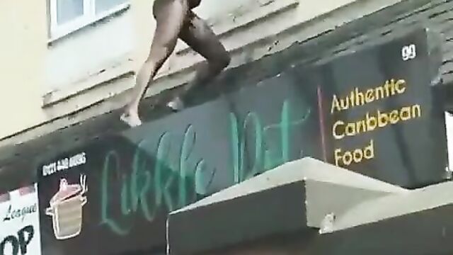 Naked Ghanaian Man Hides Outside Apartment Window In Public After Getting Caught Cheating With A Married Woman - 1 image