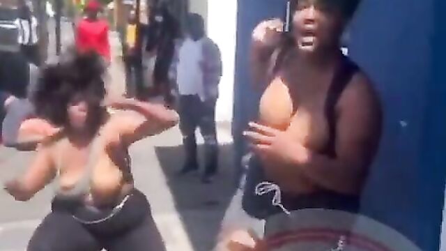 Big breasts pop out in public as 2 women fight on the street in Hartford Ghetto, CT, USA - 3 image