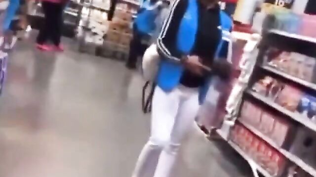 Boobs out as 2 girls fight in Walmart in public - 1 image