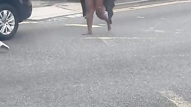 Naked ebony woman on a highway - 1 image