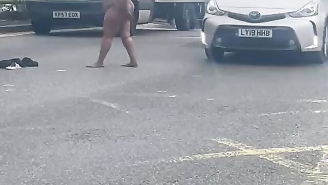 Naked ebony woman on a highway - 4 image
