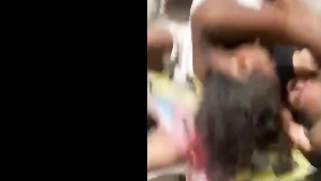 2 Brazilian women fighting in public, showing panties - 3 image