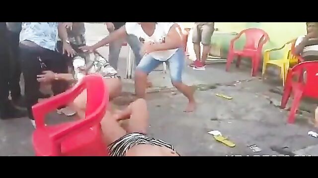 2 ladies fighting naked in public, showing breasts - 2 image