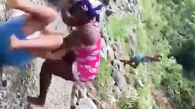 2 African women fighting and showing ass