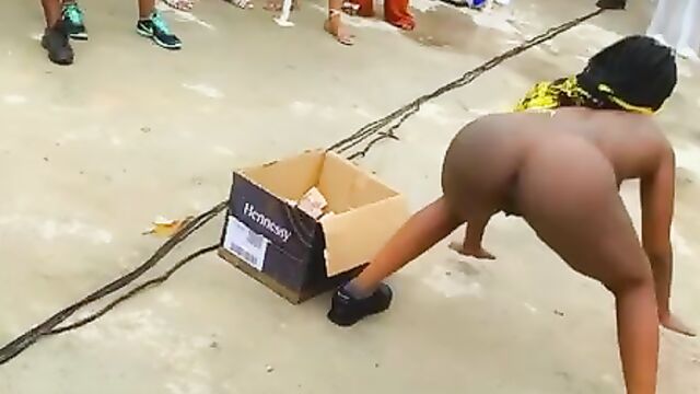 Lady dancing naked at a contest just for the money - 1 image