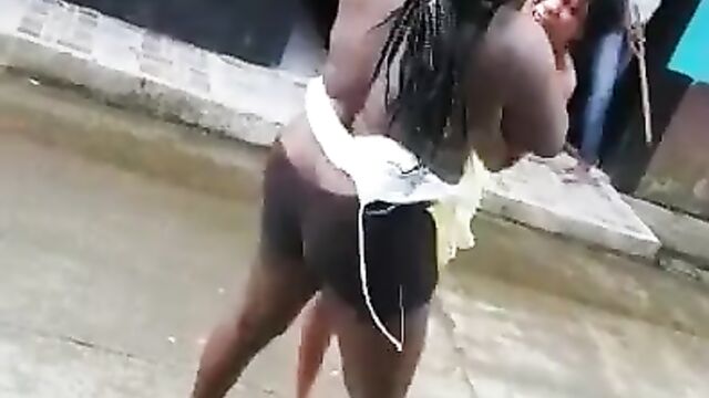 Wife strips neighbor naked for allegedly snatching her husband… Breasts exposed! - 3 image