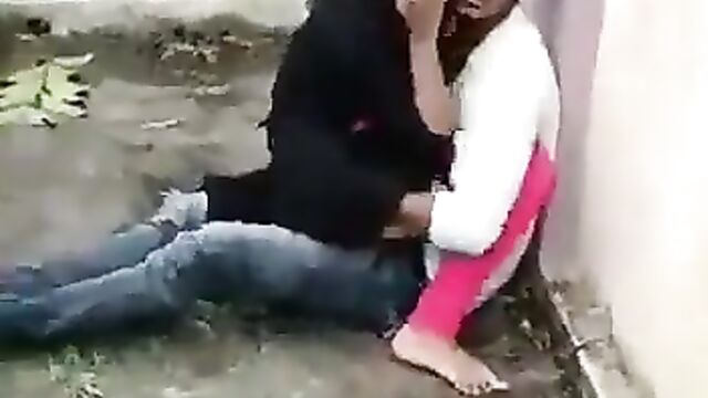 Horny couple caught having sex outdoors