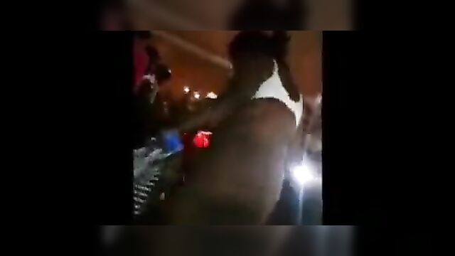 Two half naked ebony dancers at a club party - 3 image