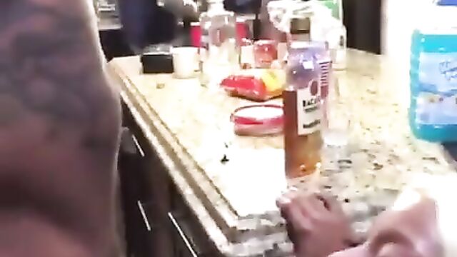 Chick giving dude blow job at a party - 1 image