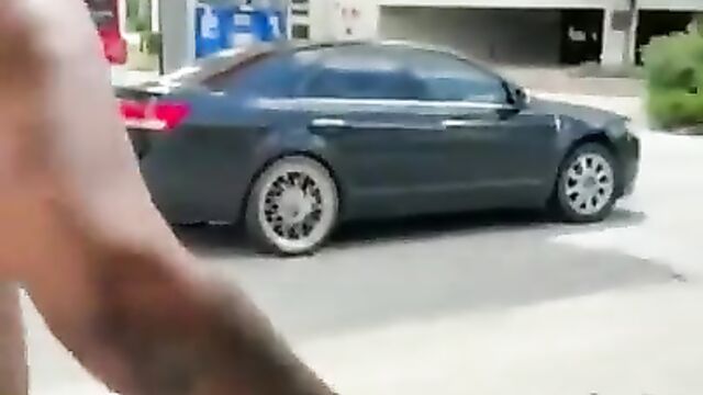 Ass and Boobs out in public as big ass chick pumps gas at the station - 1 image