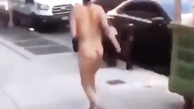 Naked woman walking on the street - 3 image