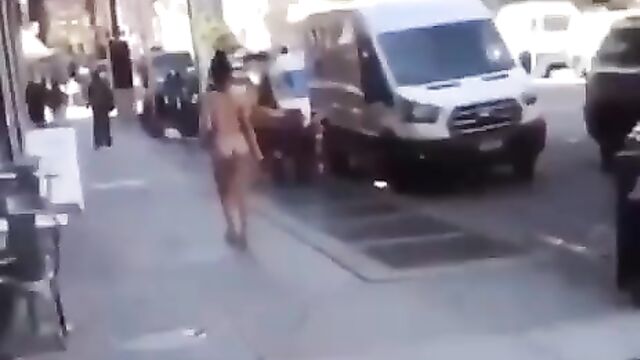 Naked woman walking on the street - 5 image