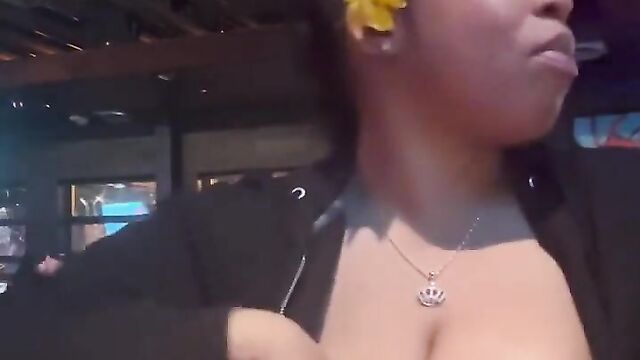 Girl caught showing her breasts in a public bar - 4 image