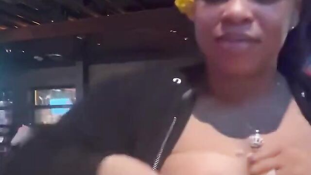Girl caught showing her breasts in a public bar - 5 image