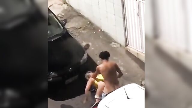 Black couple caught having sex on the street - 3 image