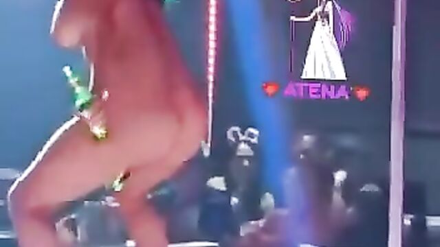 Naked woman doing it with a bottle and having sex on stage - 1 image
